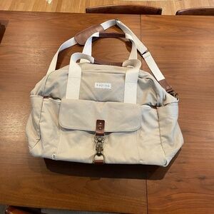 Cream Canvas Travel Bag with Minimalist Design